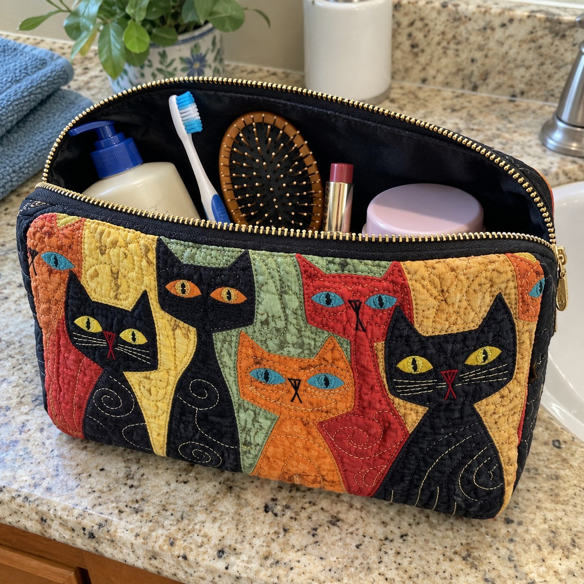 The toiletry bag unzipped with everything inside