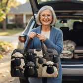 Customer holding the weekend bag